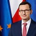  Inicialmente, Mateusz Morawiecki, su predecesor del partido populista de derecha Ley y Justicia (PiS), había sido reelegido por el presidente Andrzej Duda, en deuda con el PiS, con el pretexto de formar un gobierno. Como era de esperar, no logró ganar un voto de confianza en el parlamento. Foto: Kancelaria Premiera. Wikimedia.